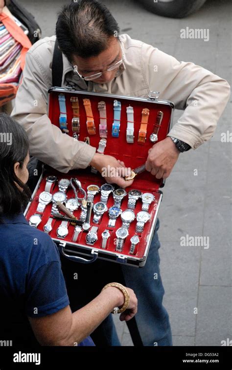 guy happily selling fake watches|fbi selling watches.